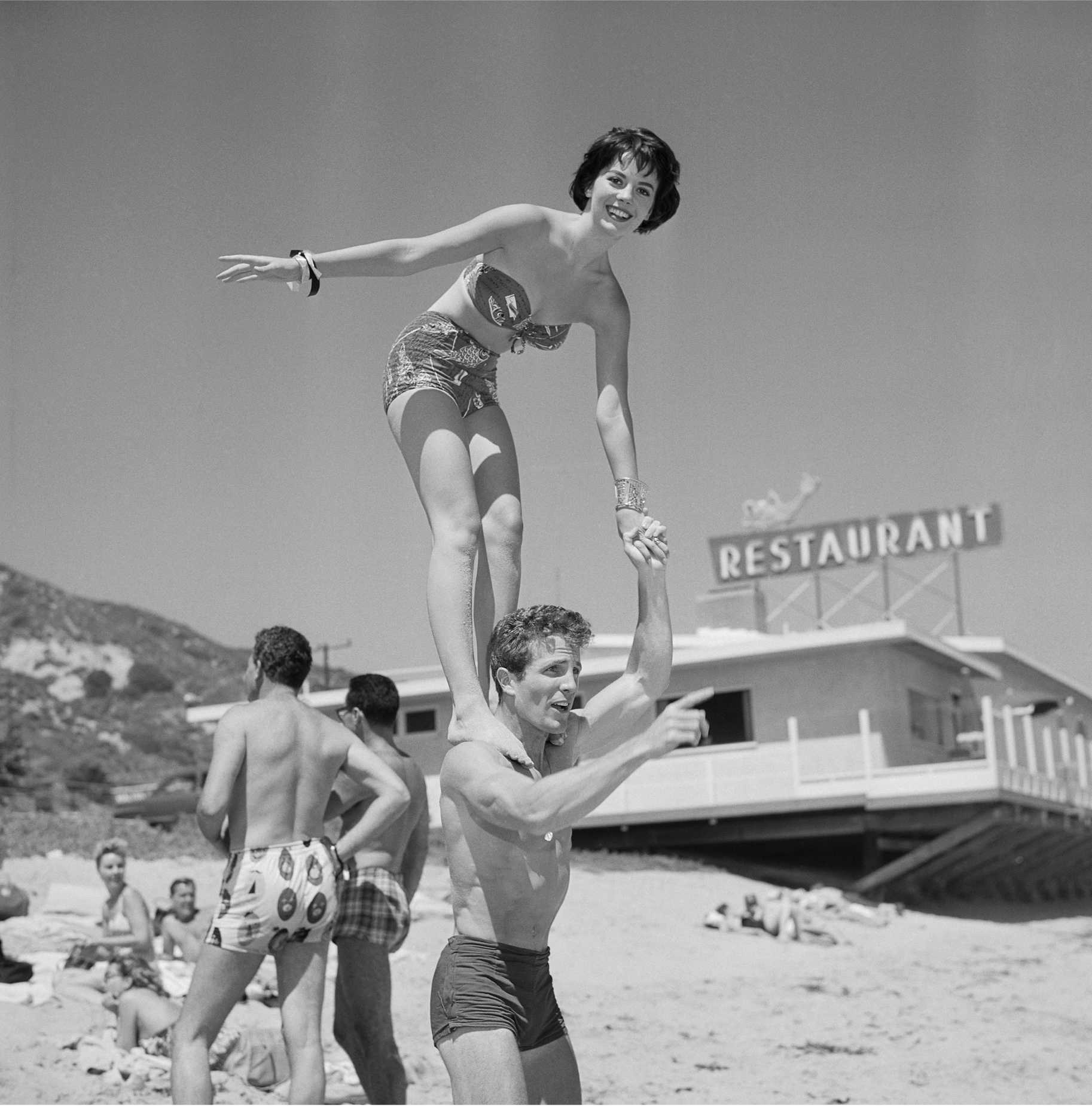 Natalie Wood and Steve Rowland at the Thalians Beach Ball in Malibu, 1956