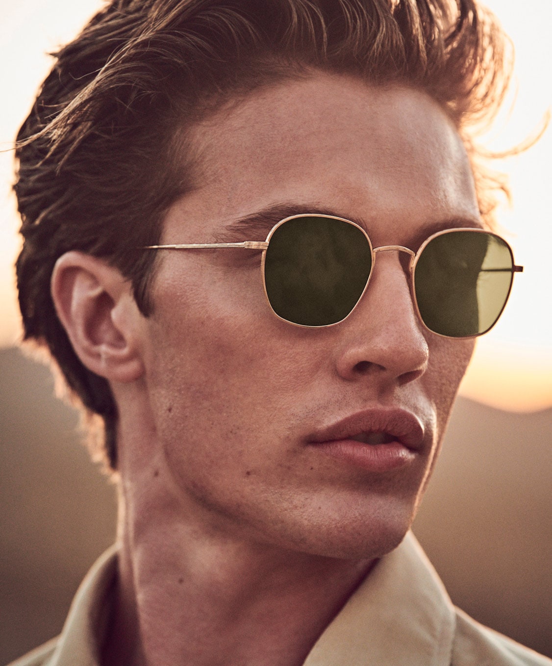Made in Japan, Adès, is a titanium style crafted with Oliver Peoples Proprietary Glass lenses.